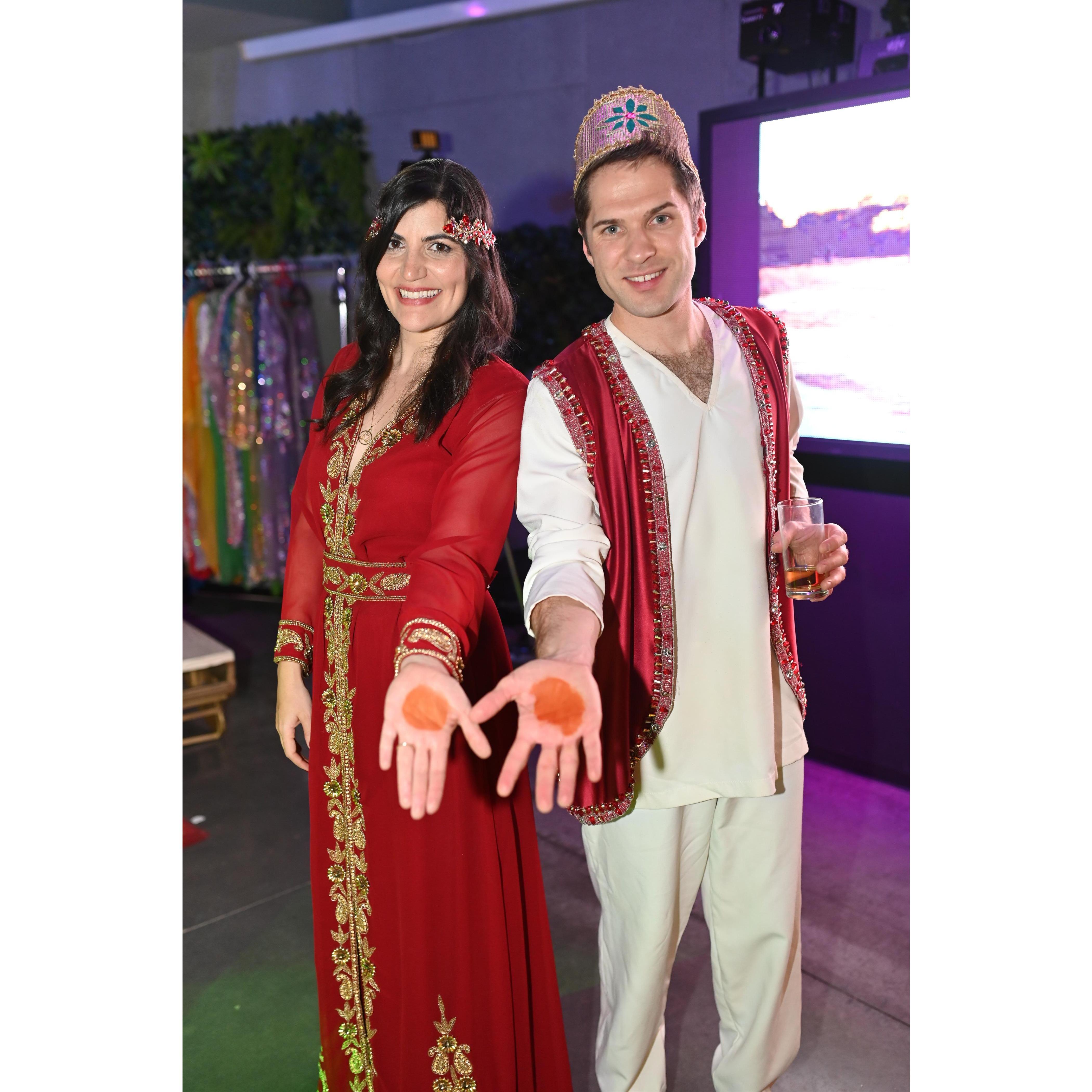 The Henna tattoo is intended to bless the couple with love, protection, and luck!