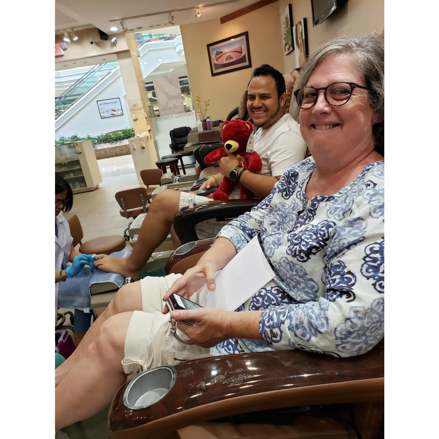 Julio and Carm enjoying Julios first pedicure!
