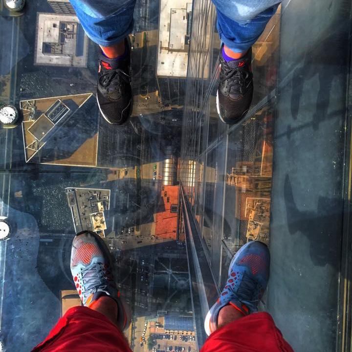 Standing at the top of the Willis (formerly Sears) tower
