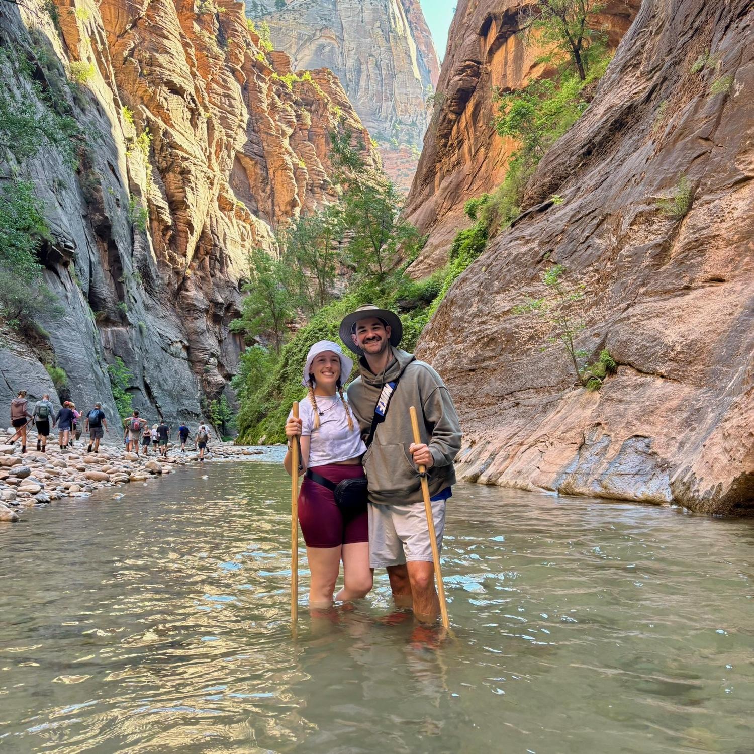Wading through freezing water in the Narrows - Zion National Park