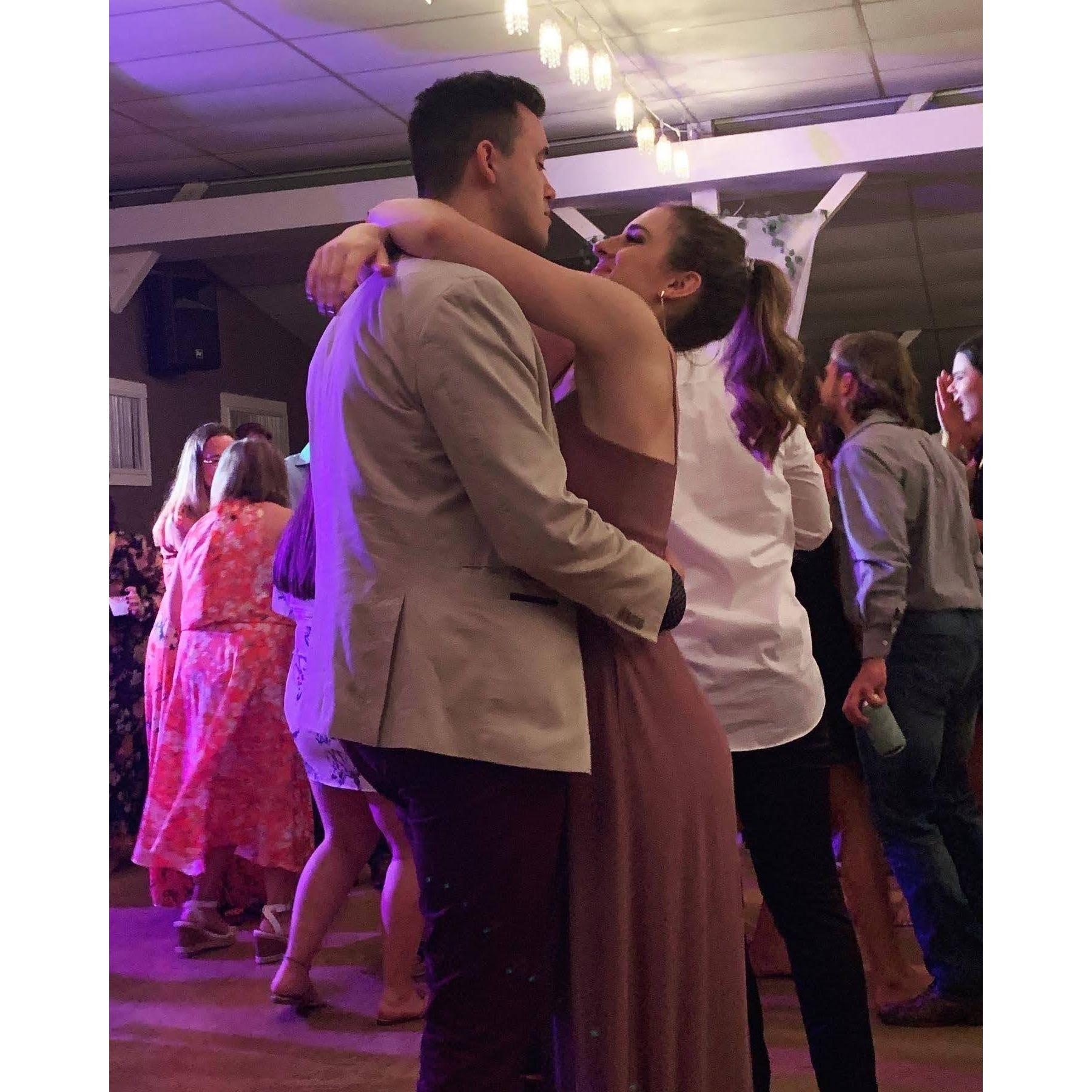 Us dancing at Regan's older sister's wedding.