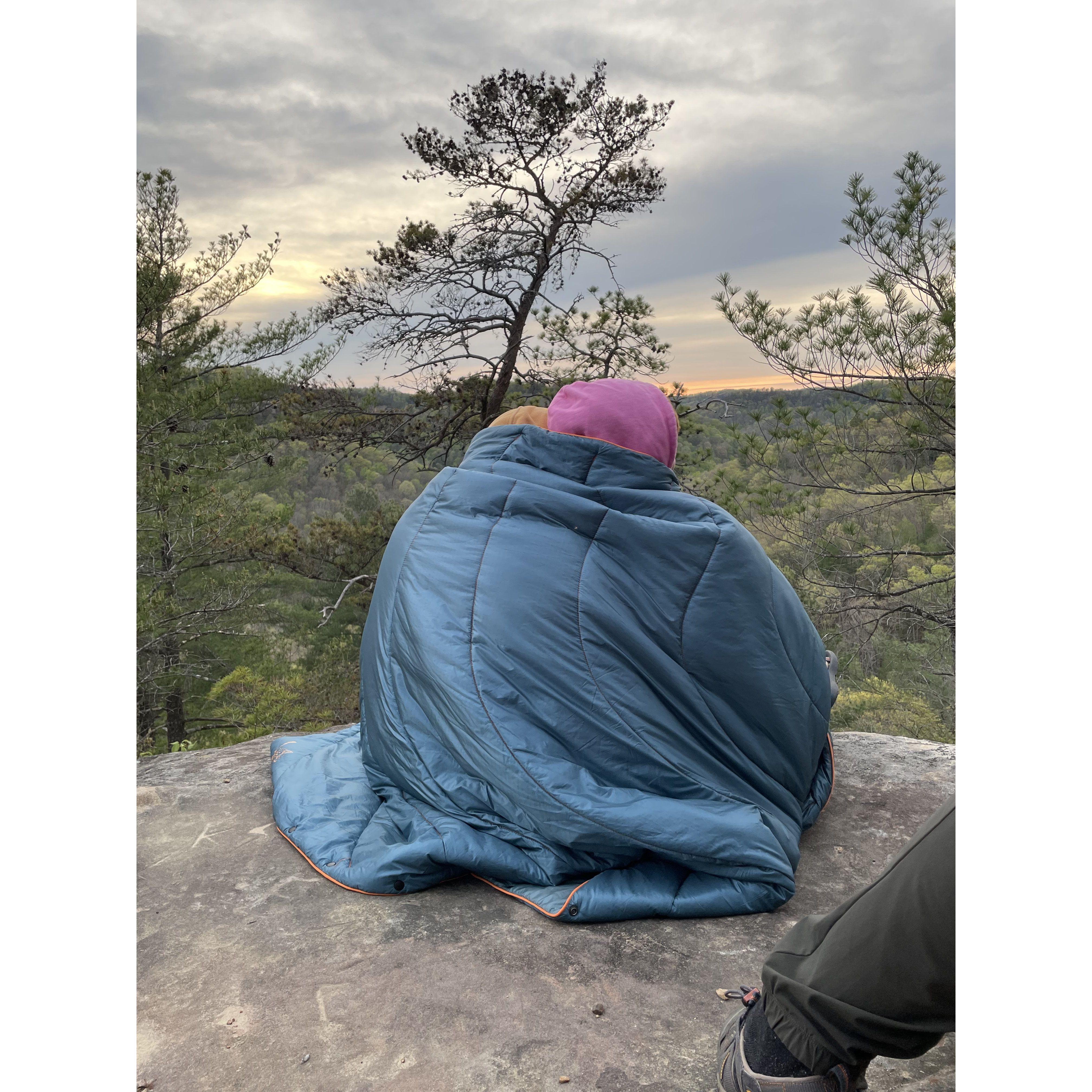 Watching the sunset together during a camping trip at Red River Gorge.