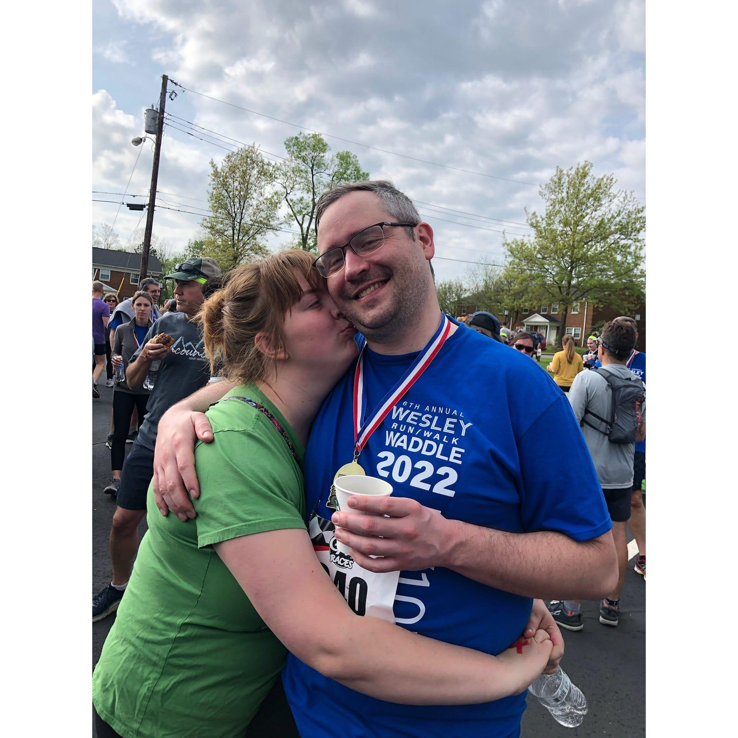 Hannah congratulating John after he completes the Wesley Waddle 5k which he runs as a tradition with his aunt