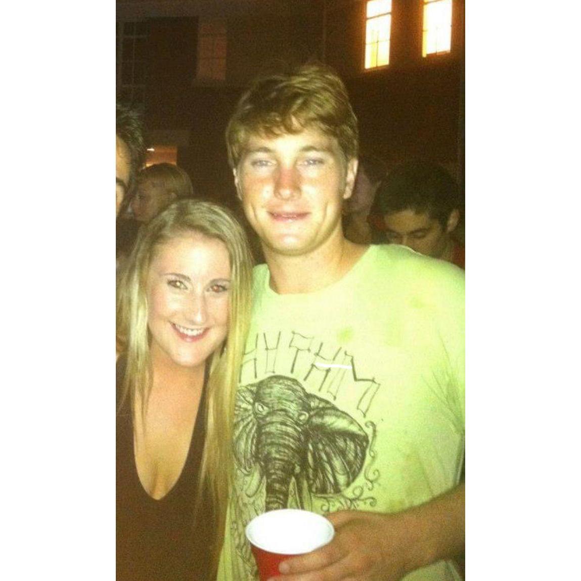 The night we met & our first photo together featuring the lime green, elephant shirt :). October 12, 2012.