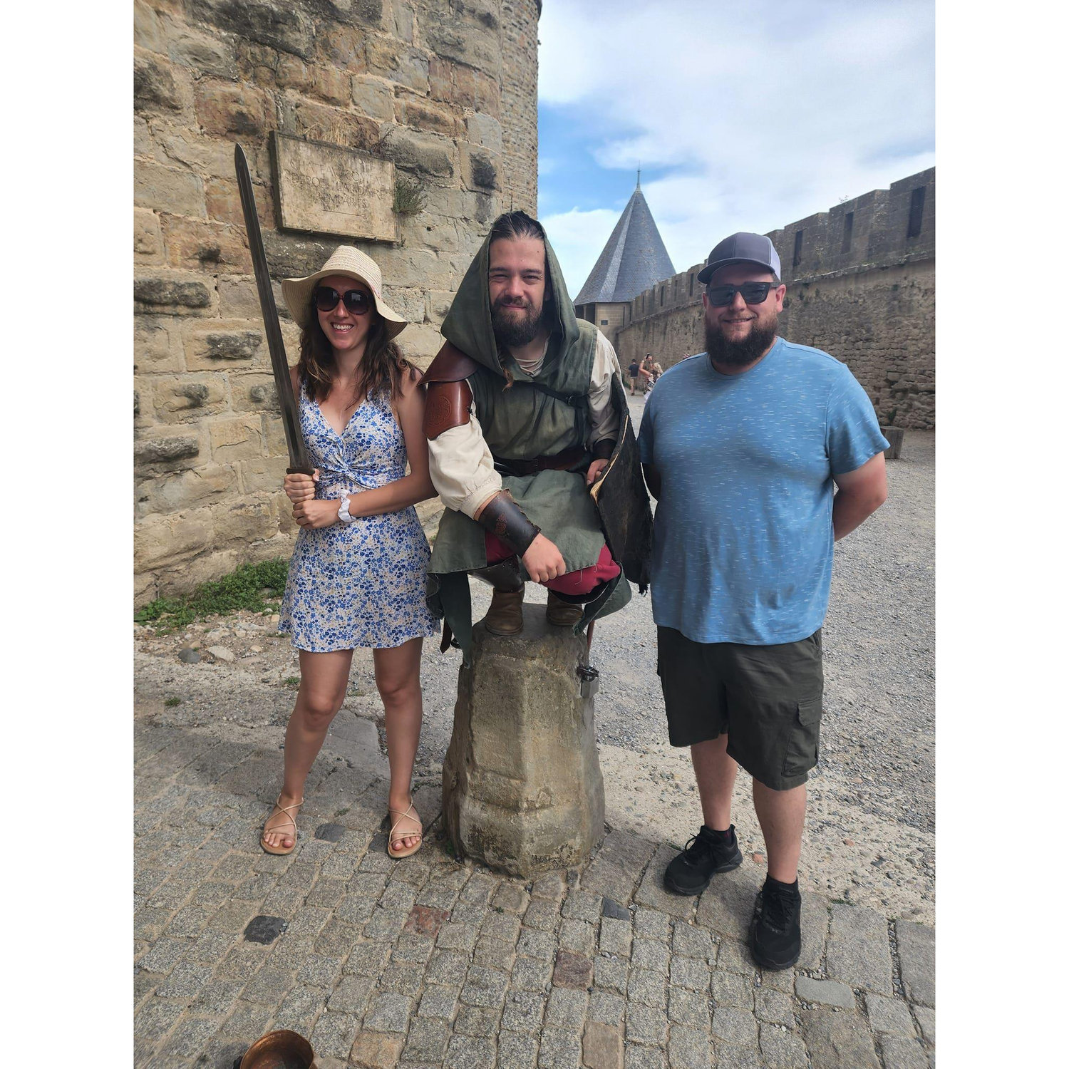 Posing with a medieval cosplayer in Carcassonne, France