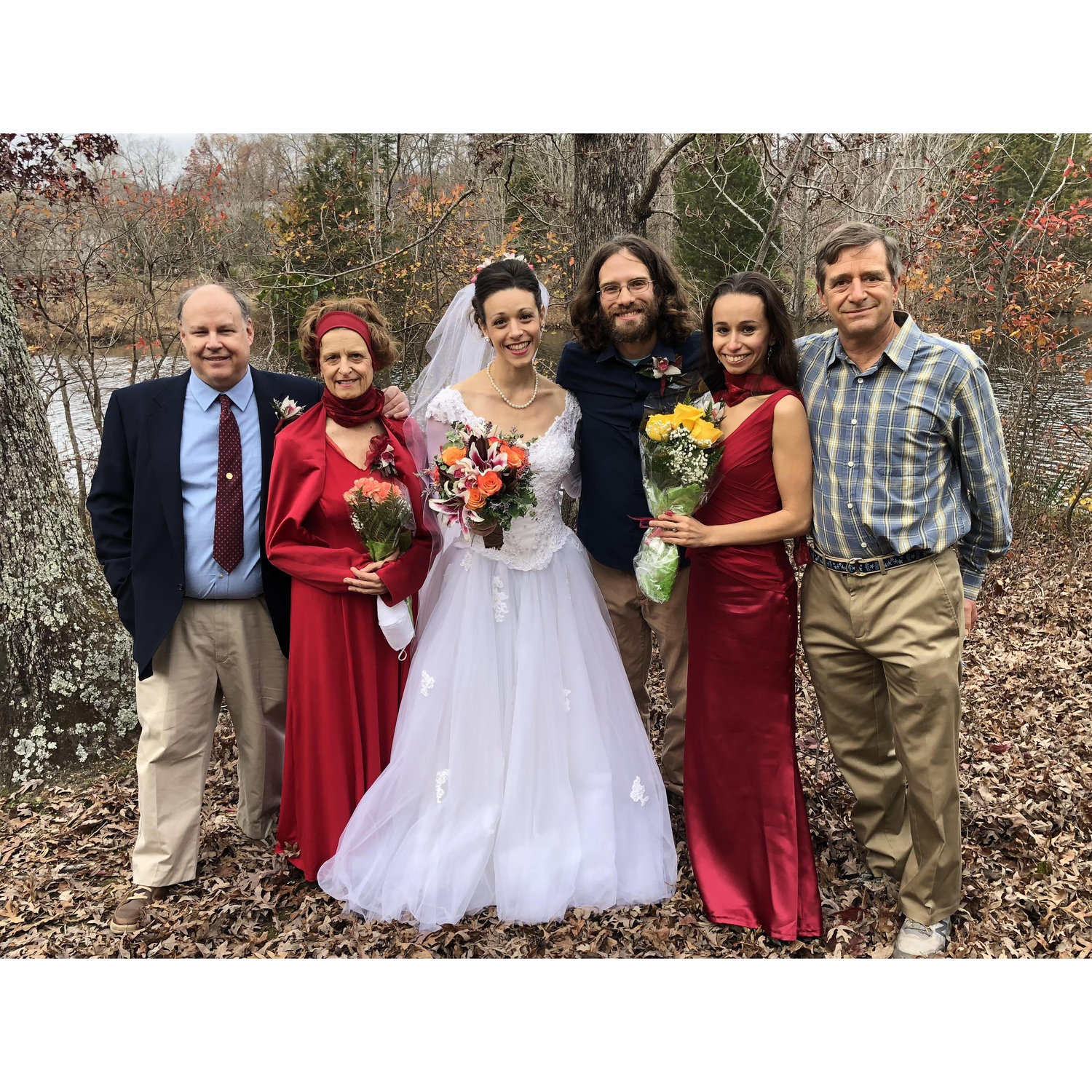 Us with Amberly's parents, sister, and uncle.... Nick's new in laws! Both of the ladies are holding their gratitude carnations and roses we gave them as a thank you for raising Amberly.