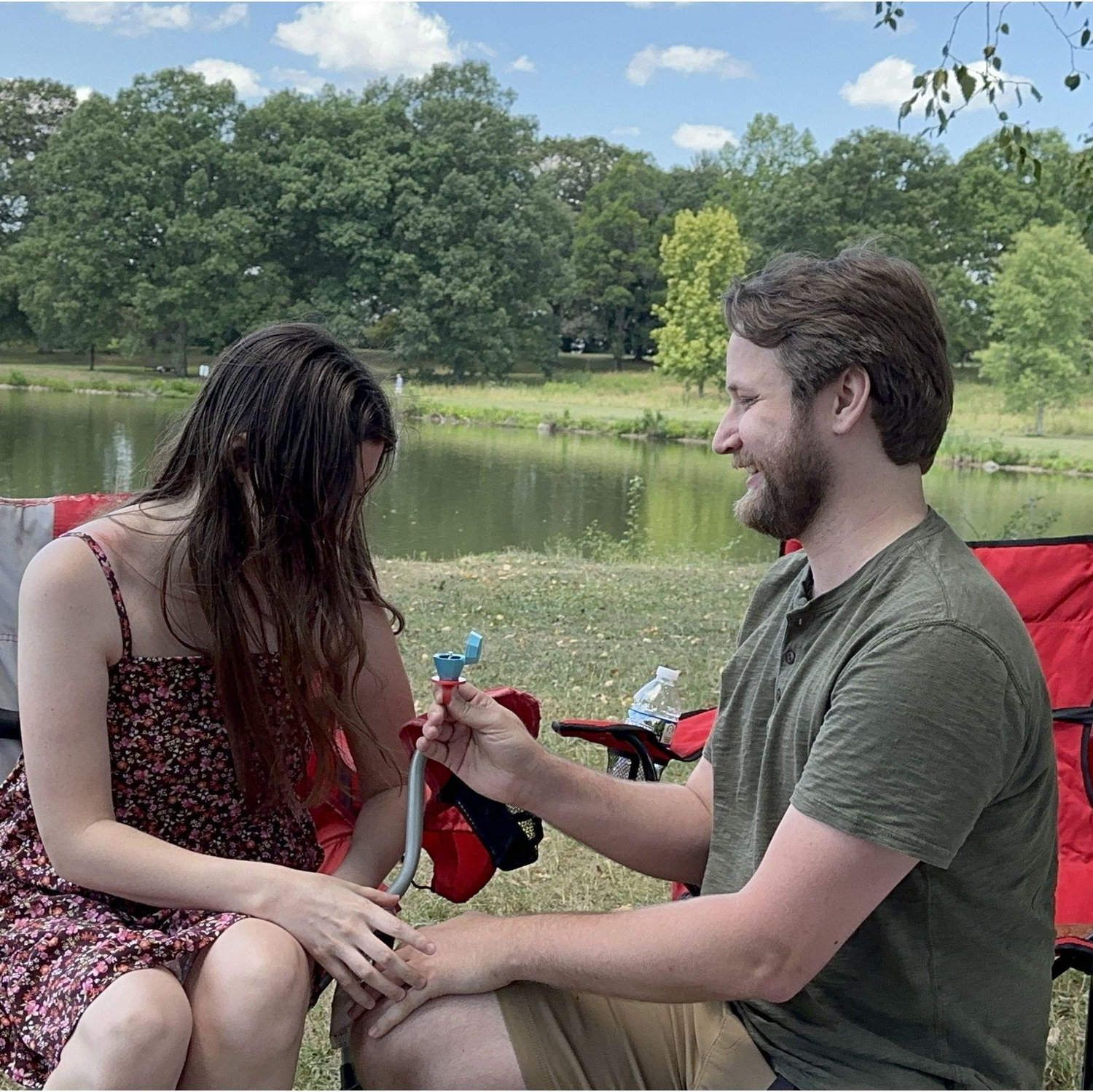 Brandon popped the question with the most beautiful ring-the ring holder really made it pop too!