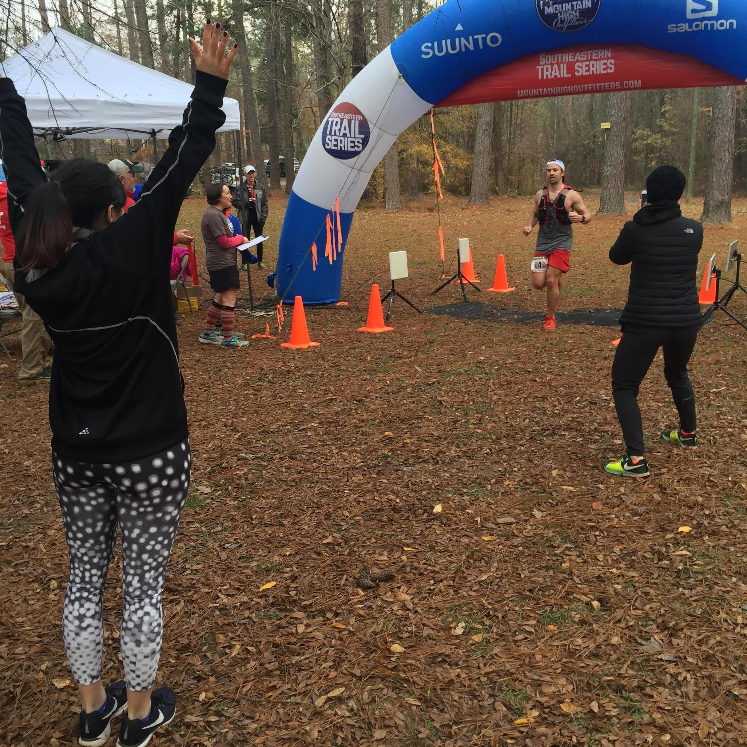 Doug earning a respectable 2nd place for the second time in his second 50K trail race.  Lucy stepped back so she could cheer him on as he finished.