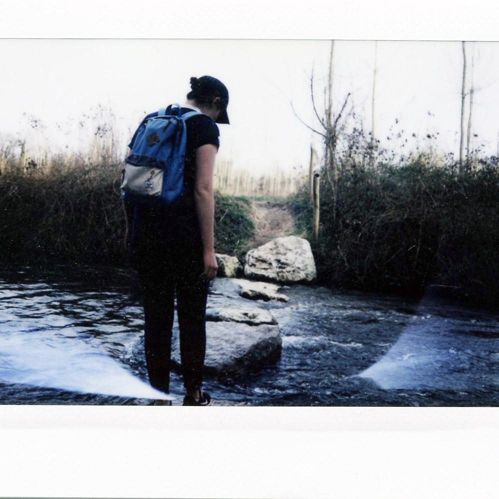 Sarah tries not to fall in during a hike outside of Milan, 2017