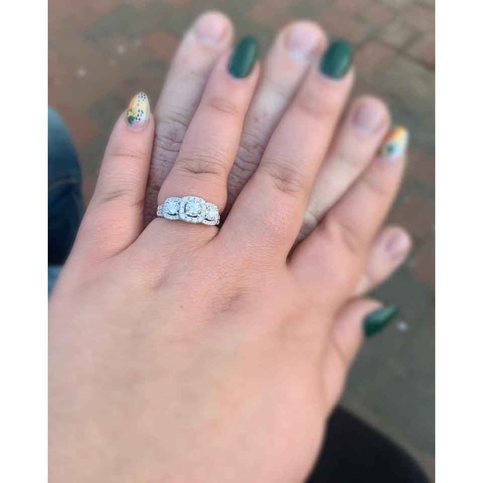 We got engaged in Nashville, TN. This was the night of our engagement sitting by the river.