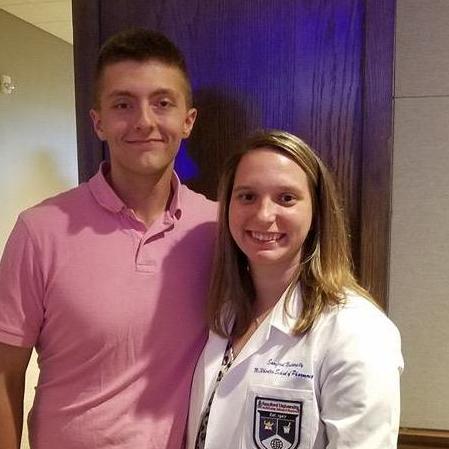 Emilee earning her white coat