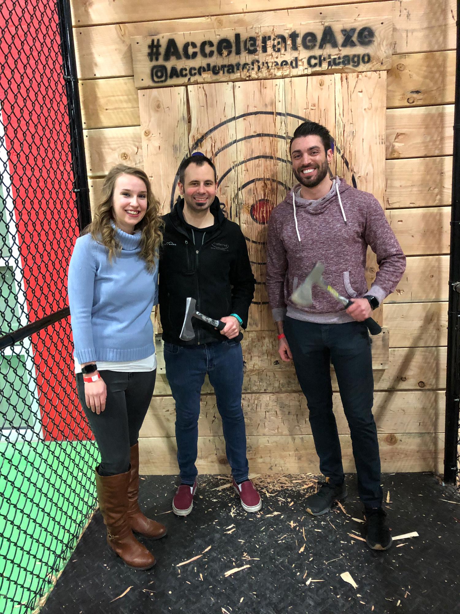 Kaylah and A.P. axe throwing with a random bro they met there.