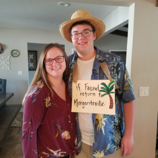 Getting ready for our annual Halloween Party! He was completely ready, and she hadn't even started (Typical!)