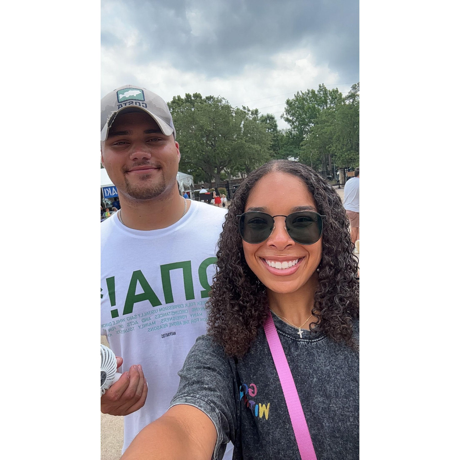 Summer 2025 — Olivia and Bill at St. Basil the Great Greek Orthodox Church, celebrating the Greek Festival and enjoying delicious food with family!