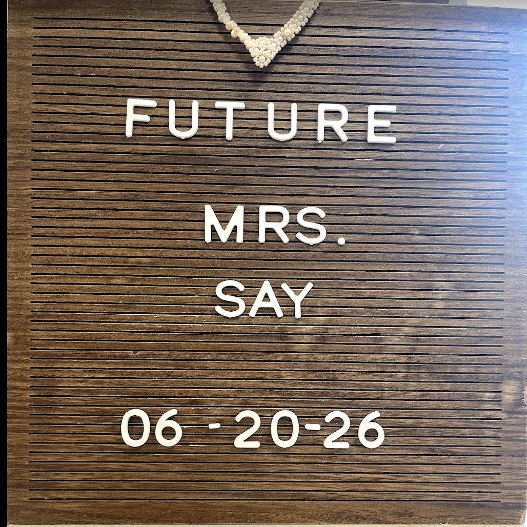 Photo credit to Camila! A sign at the dress appointment, with Auntie Thel's necklace.