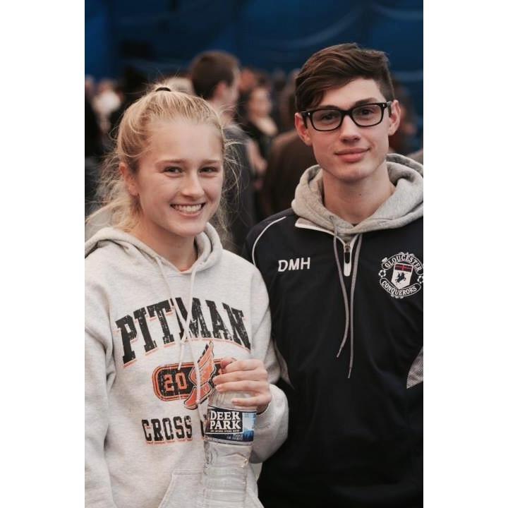 Drew supporting Alyssa at a high school track meet