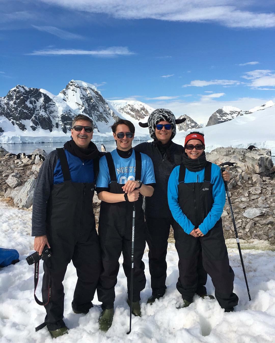 Sam with his family on Antartica!