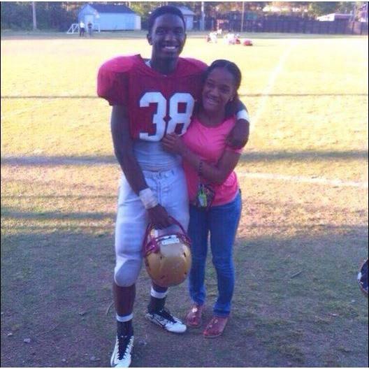 our very first photo together during spring football our freshman year of high school