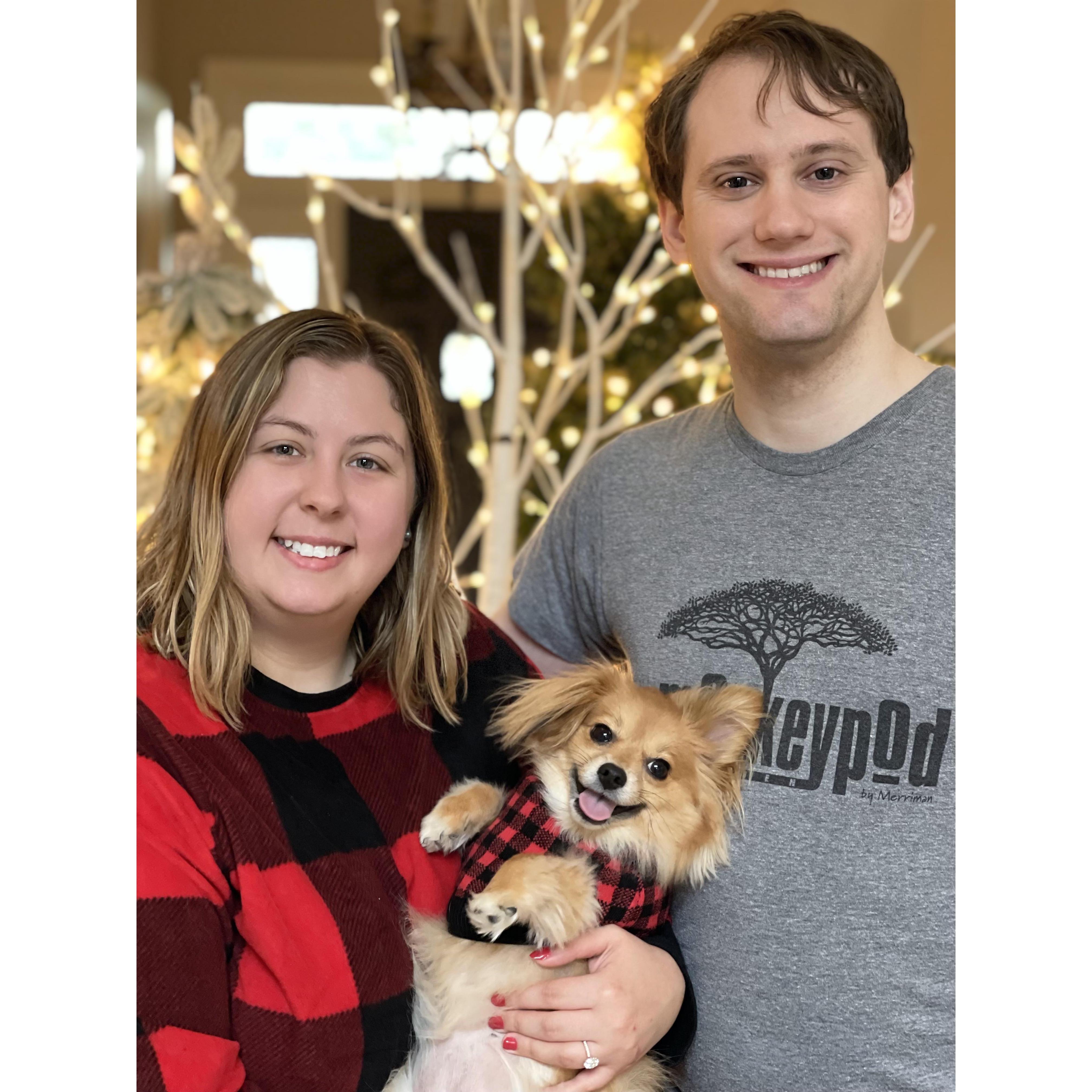The couple celebrating Christmas with their dog, Noodle.