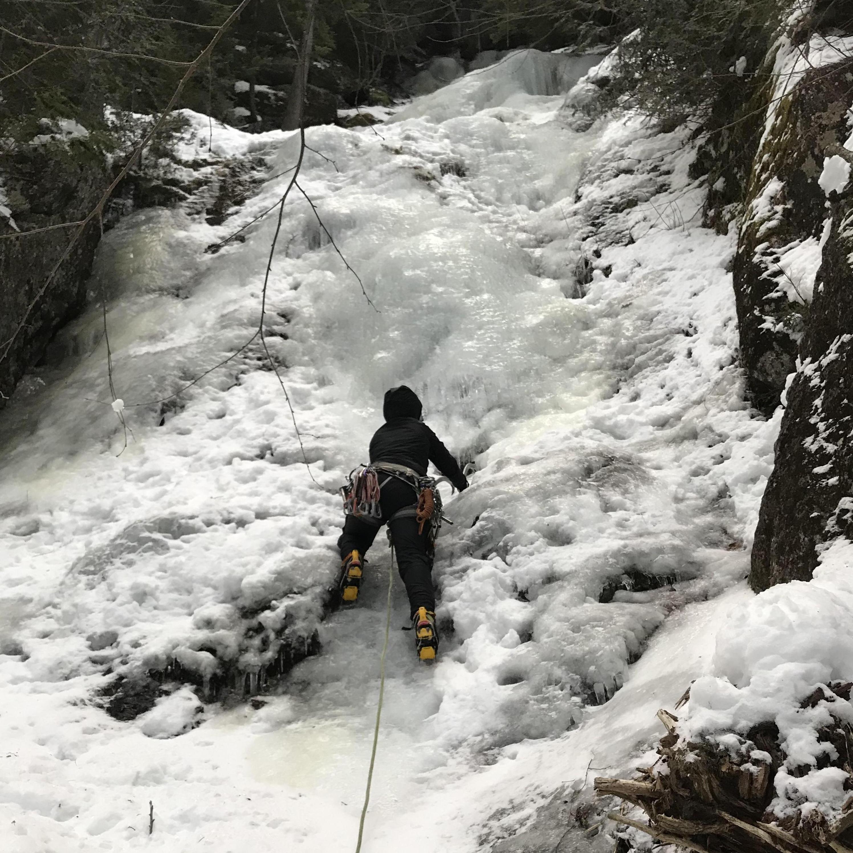 Alexis leading up some awesome ice in Chapel Pond Canyon.