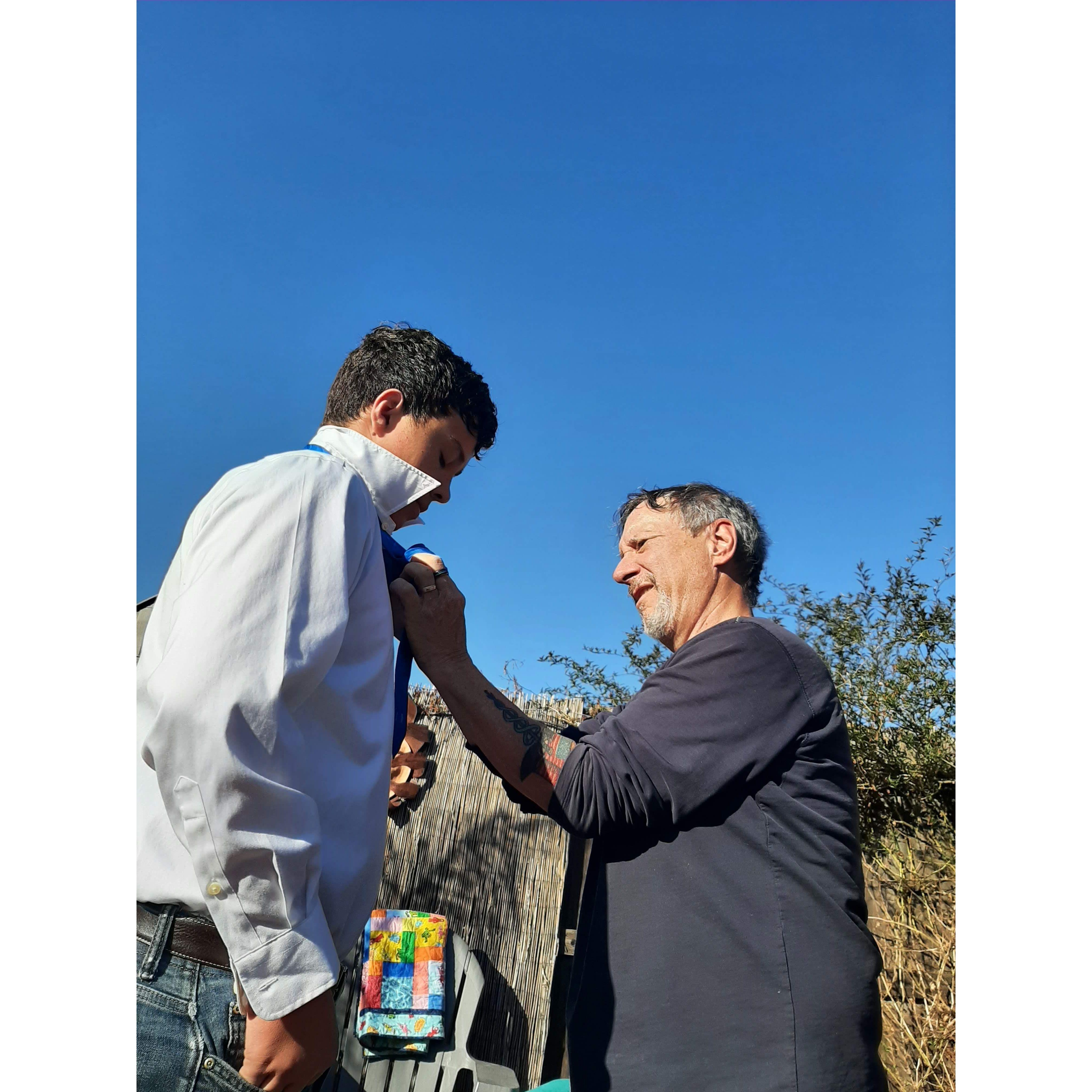 teaching Sem to tie a tie for Eliyas birthday