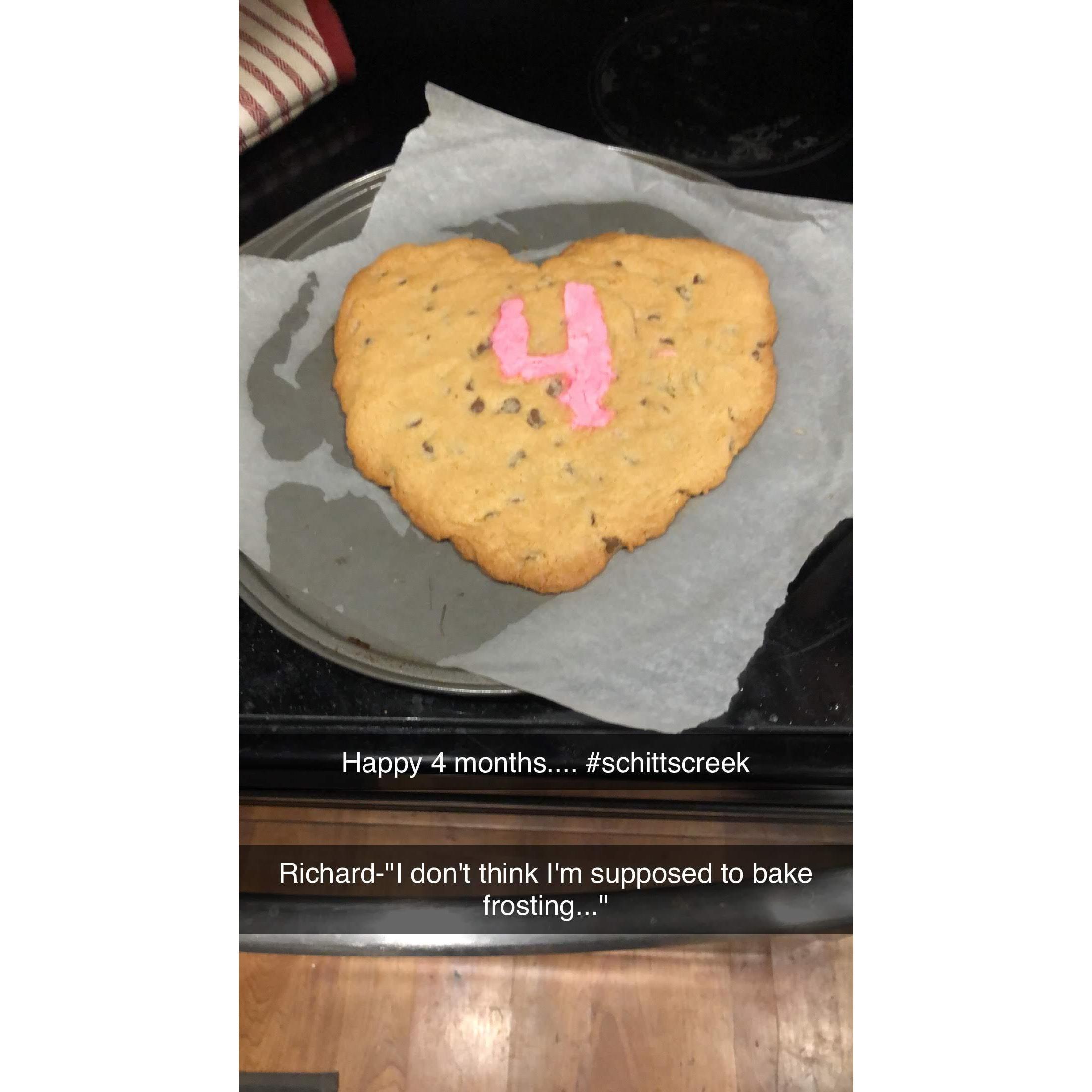 Richard made Cara a 4 month anniversary cookie in reference to the first show they watched together, Schitts Creek.