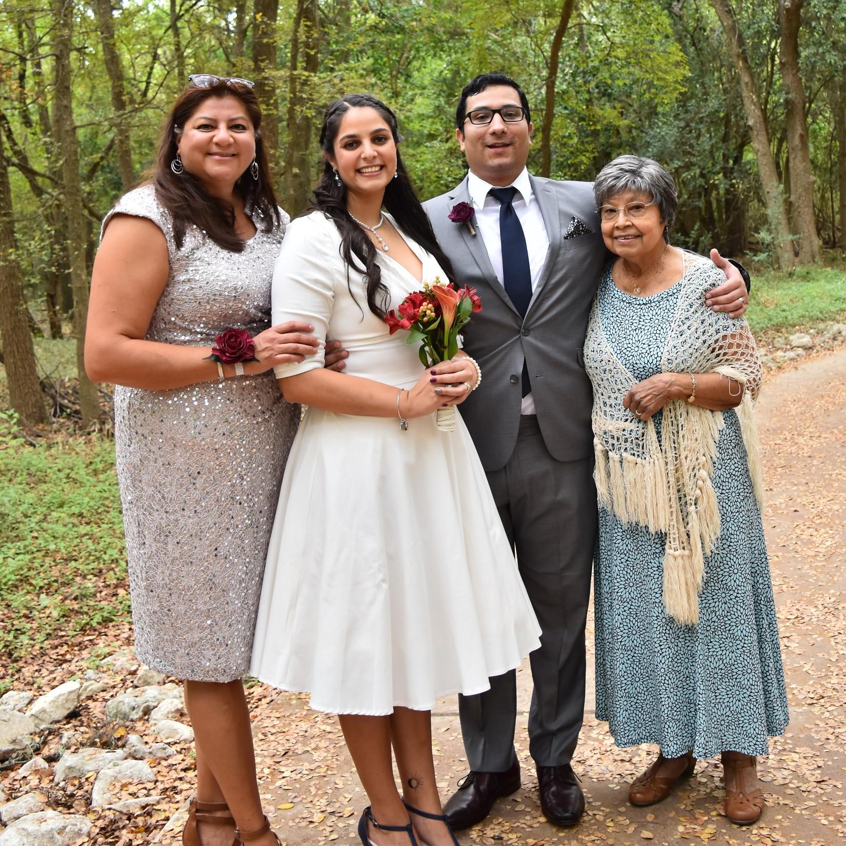 Our official wedding photo with our Moms