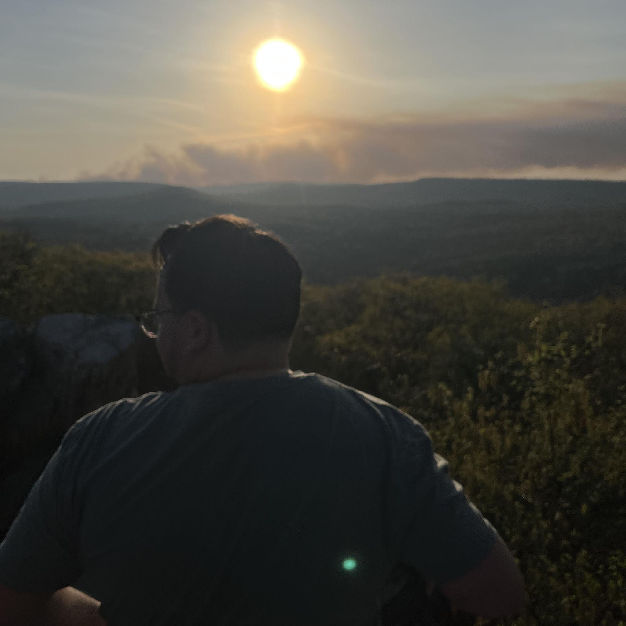 Evan taking photos at Pole Steeple.