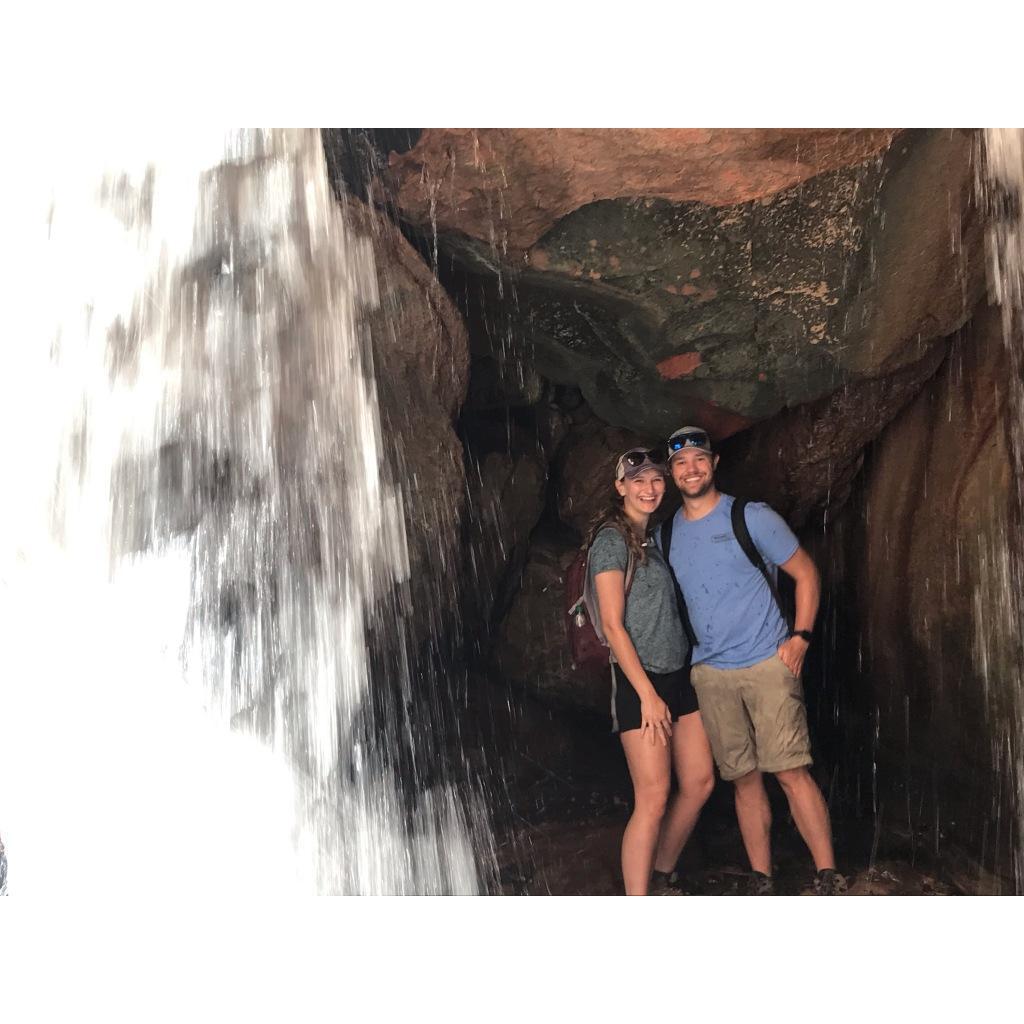 Underneath a waterfall in Zion National Park