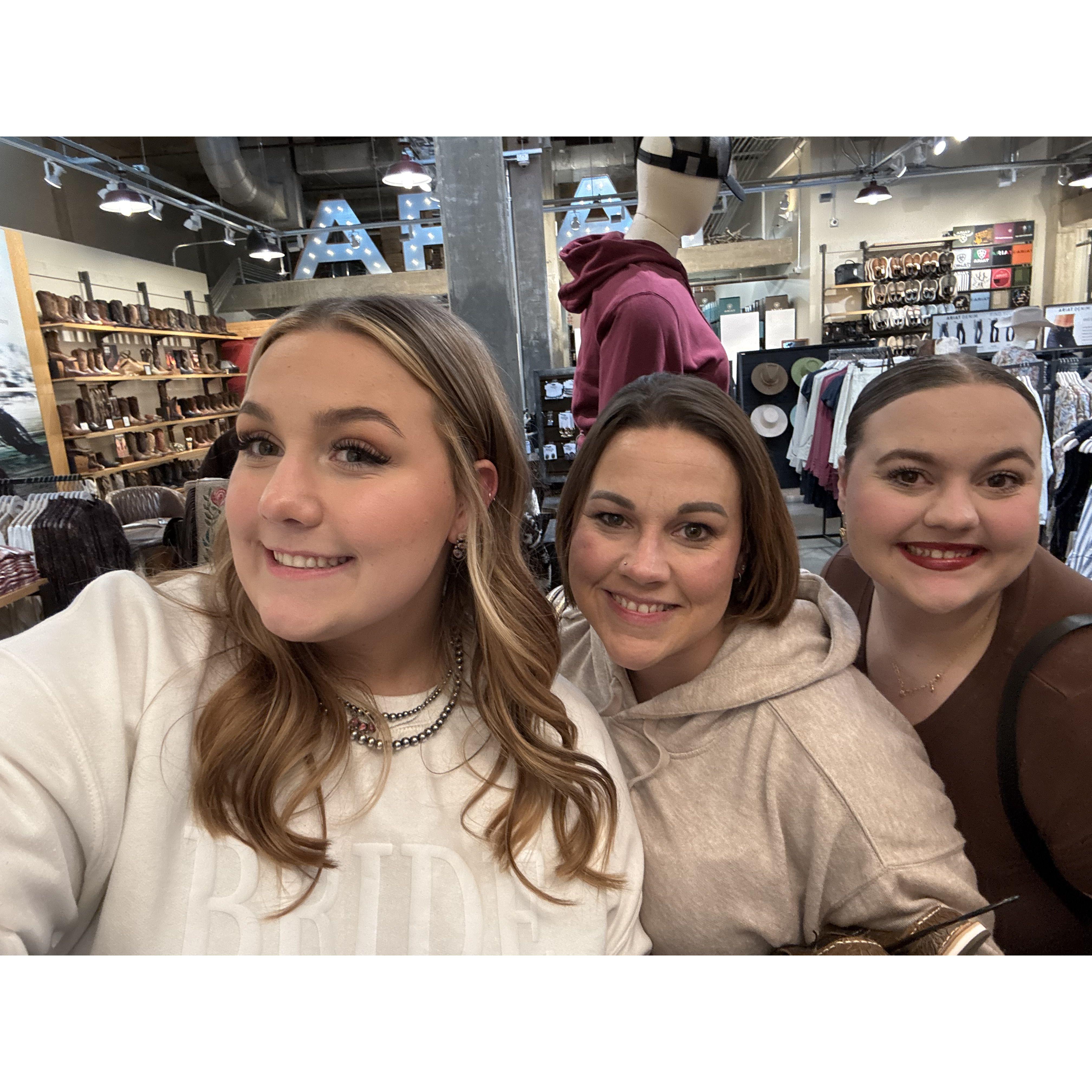 Me, my mom, and my sister Emma getting my wedding dress!