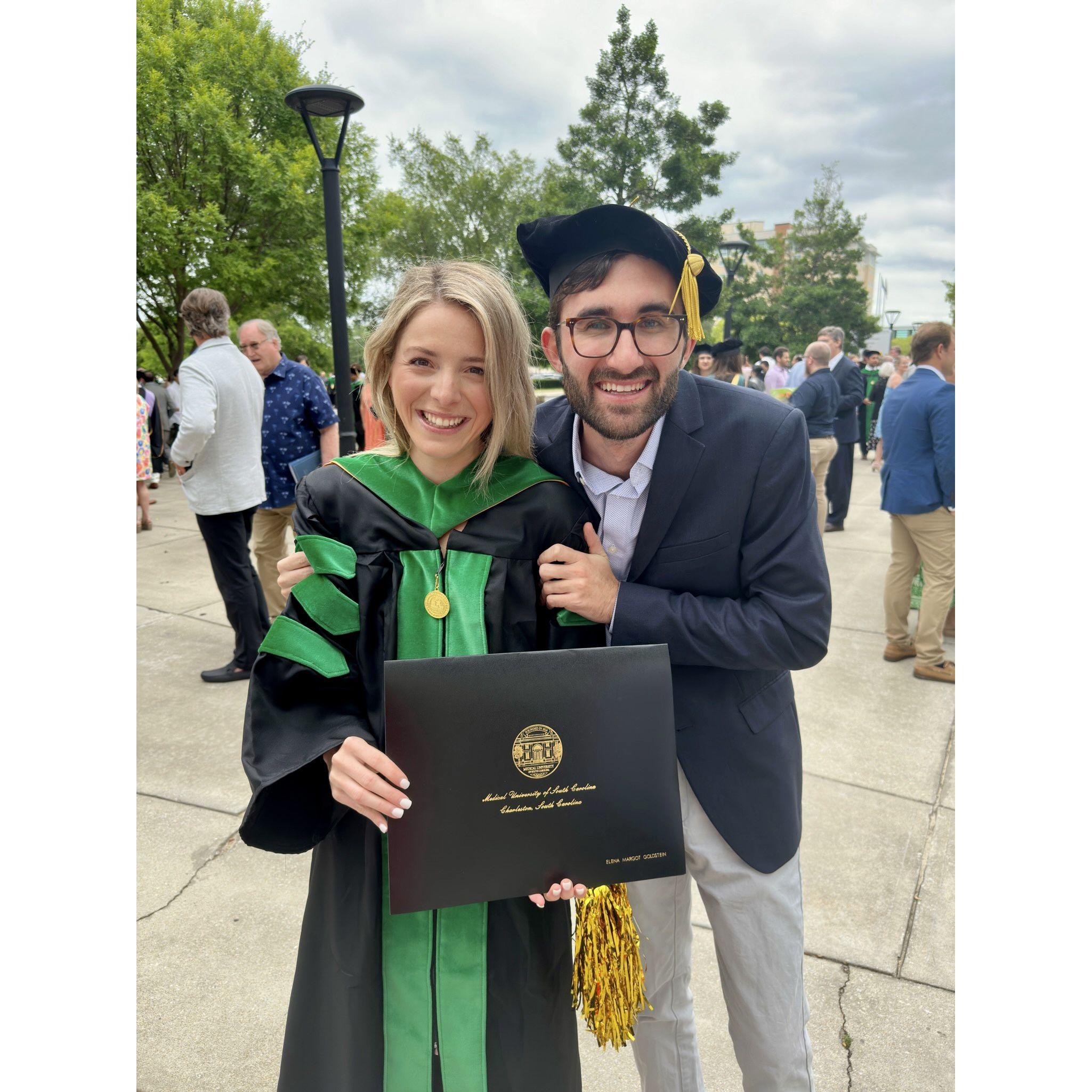 Elena graduates from medical school with Spencer by her side!