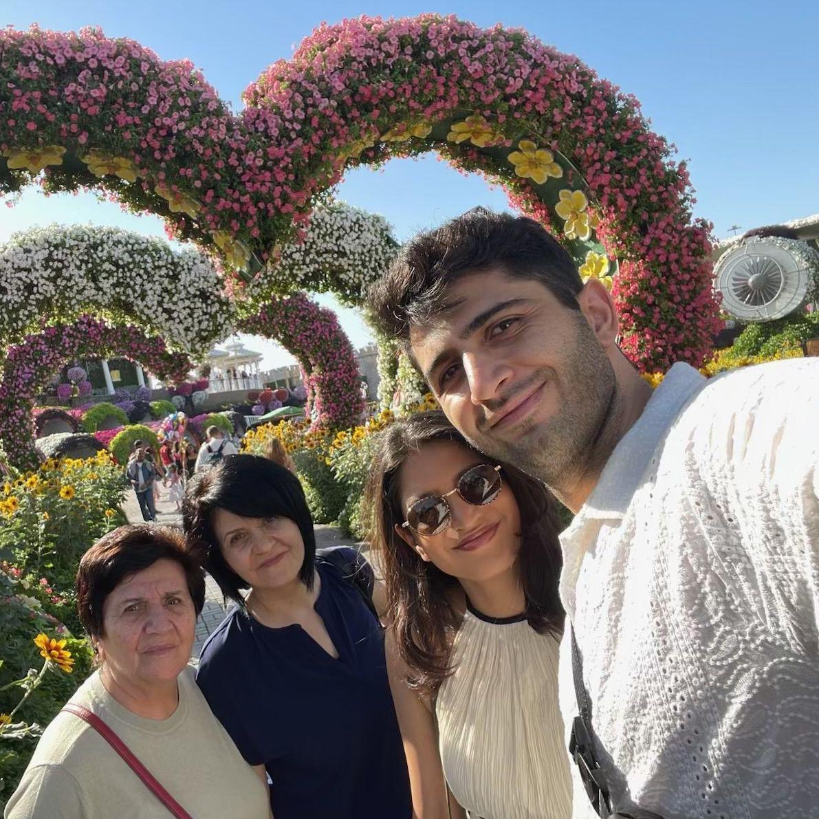 Us with Tigran's mom and grandma at the Miracle Gardens in Dubai