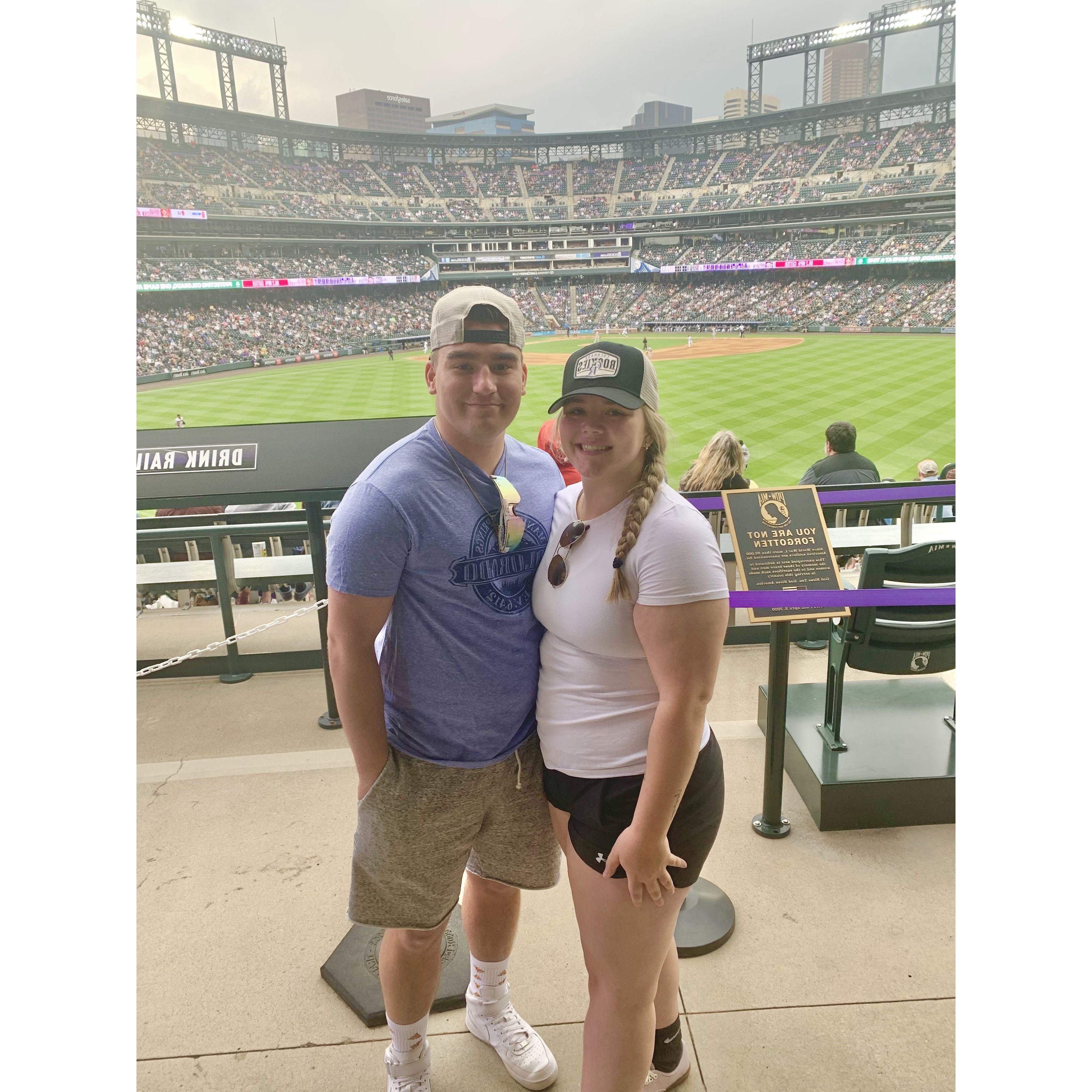This is a photo from our second date. Teagun's first ever Colorado Rockies Baseball game. Not only did they win but we became official!