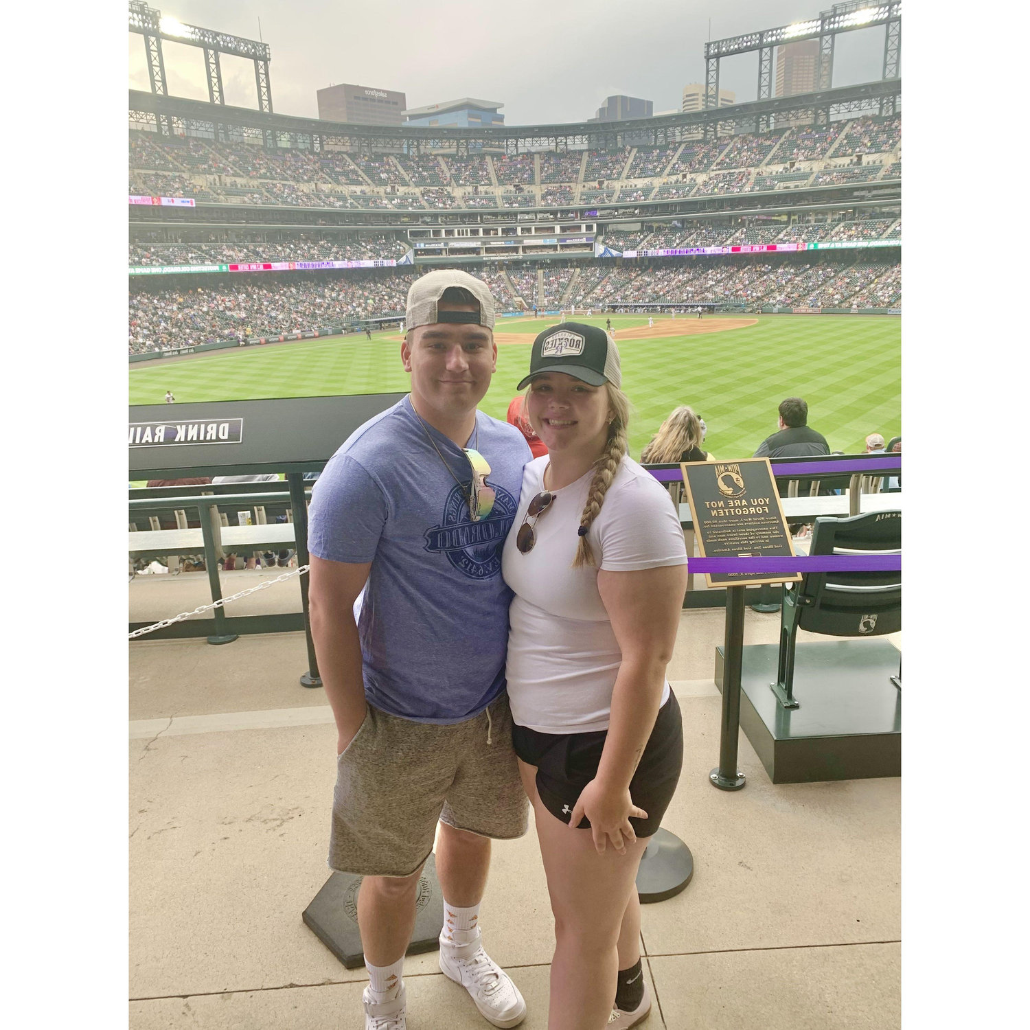 This is a photo from our second date. Teagun's first ever Colorado Rockies Baseball game. Not only did they win but we became official!