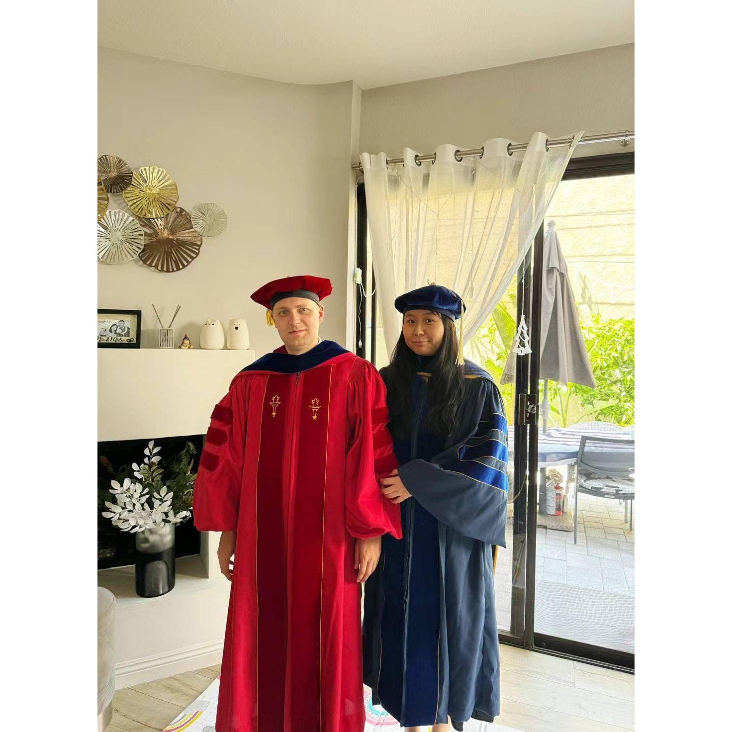 Drs Huang and Pilgram embracing the crosstown rivalry