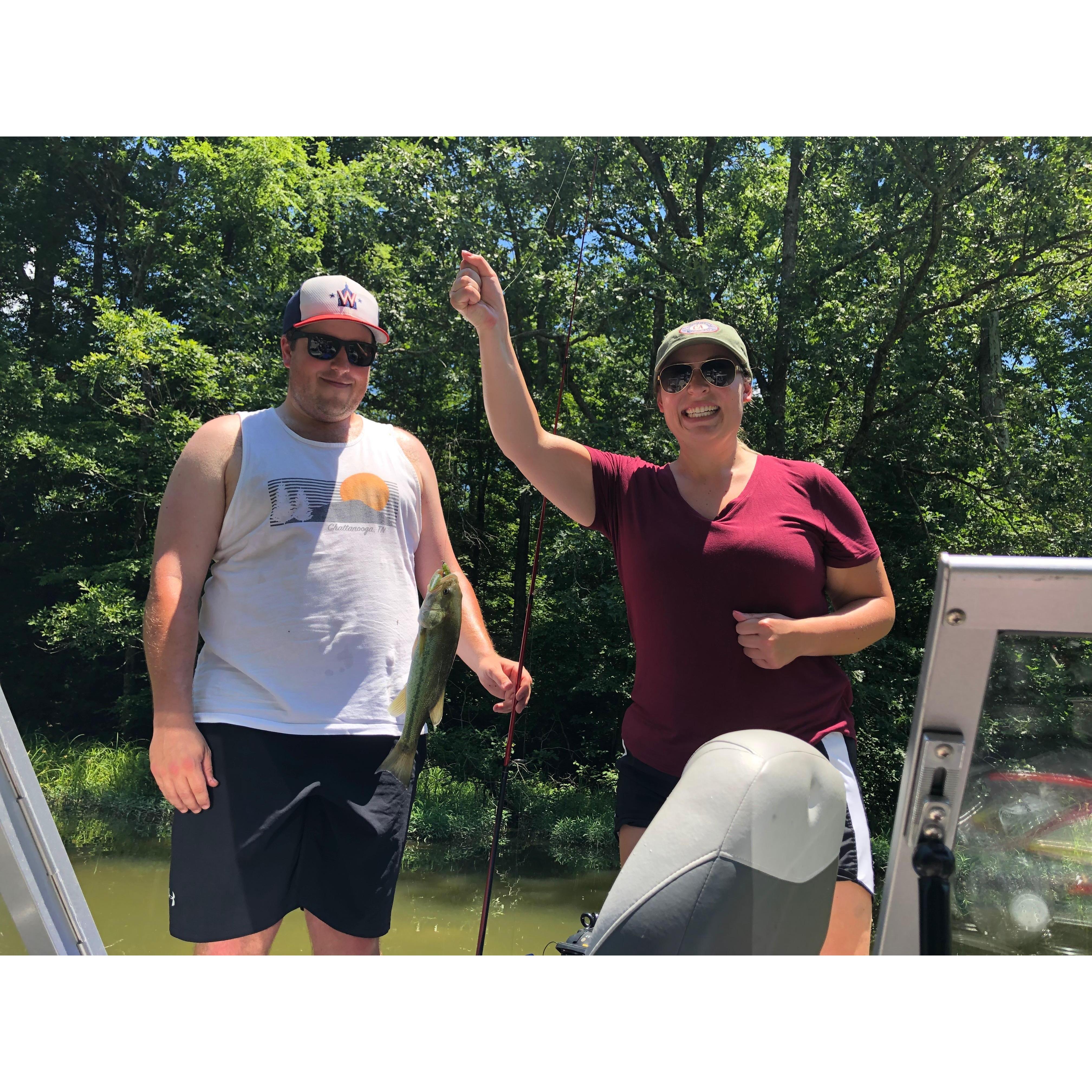 Maddie with the best catch (both the fish and the man)!