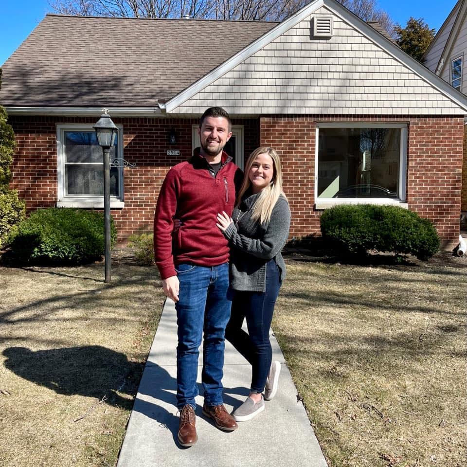 Closing on our house on March 19th - little did Annie know, Sam had a ring in his pocket!