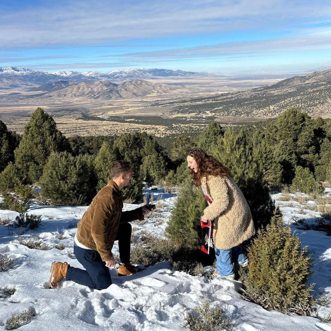 November 2024 - While cutting down a Christmas tree Mattias proposed. Mattias had Claire try cut it down first to distract Claire and get down on a knee. She gave up very quickly, so he did not have much time.