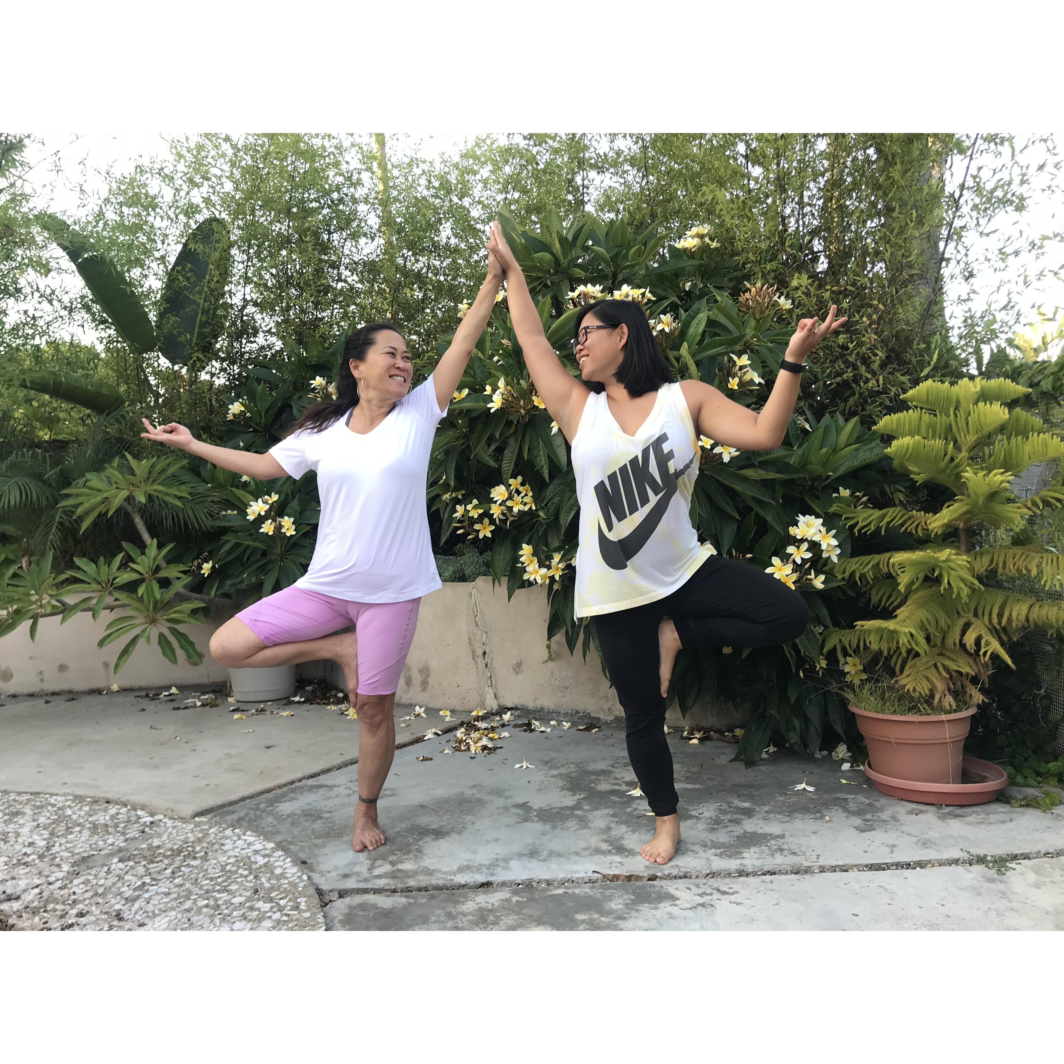Kelly (Kalia's mom) and Kalia doing a yoga pose together for an Instagram challenge