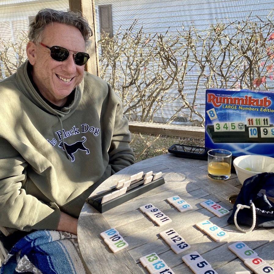 Playing Rummikub on the wonderful screened in porch on Rocking Horse Lane.