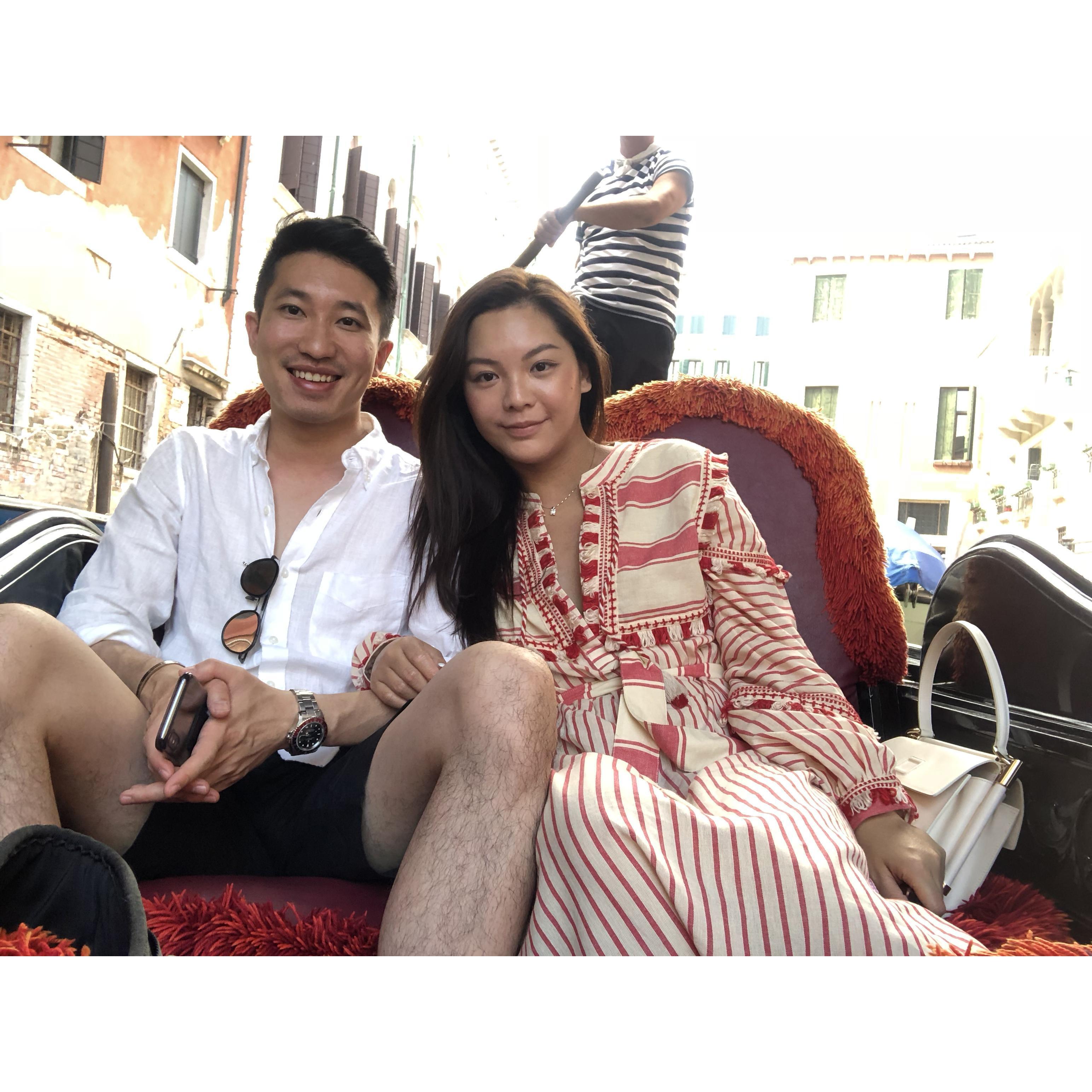 On a gondola boat in Venice, Italy.