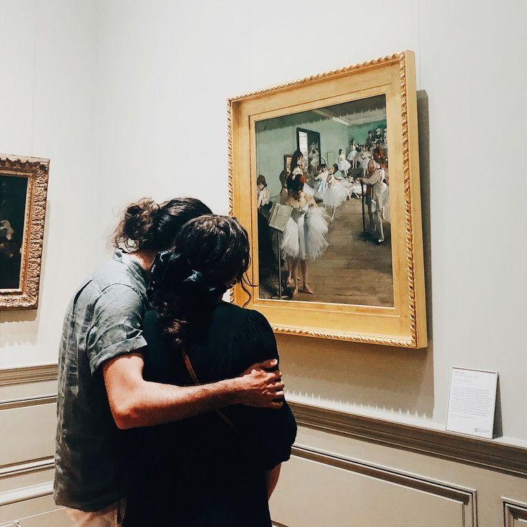 Us at the Met in New York City, looking at a Degas painting. While we were there, we bought a print of "The Unicorn Rests in a Garden", which hangs in our living room and inspired our invitations.
