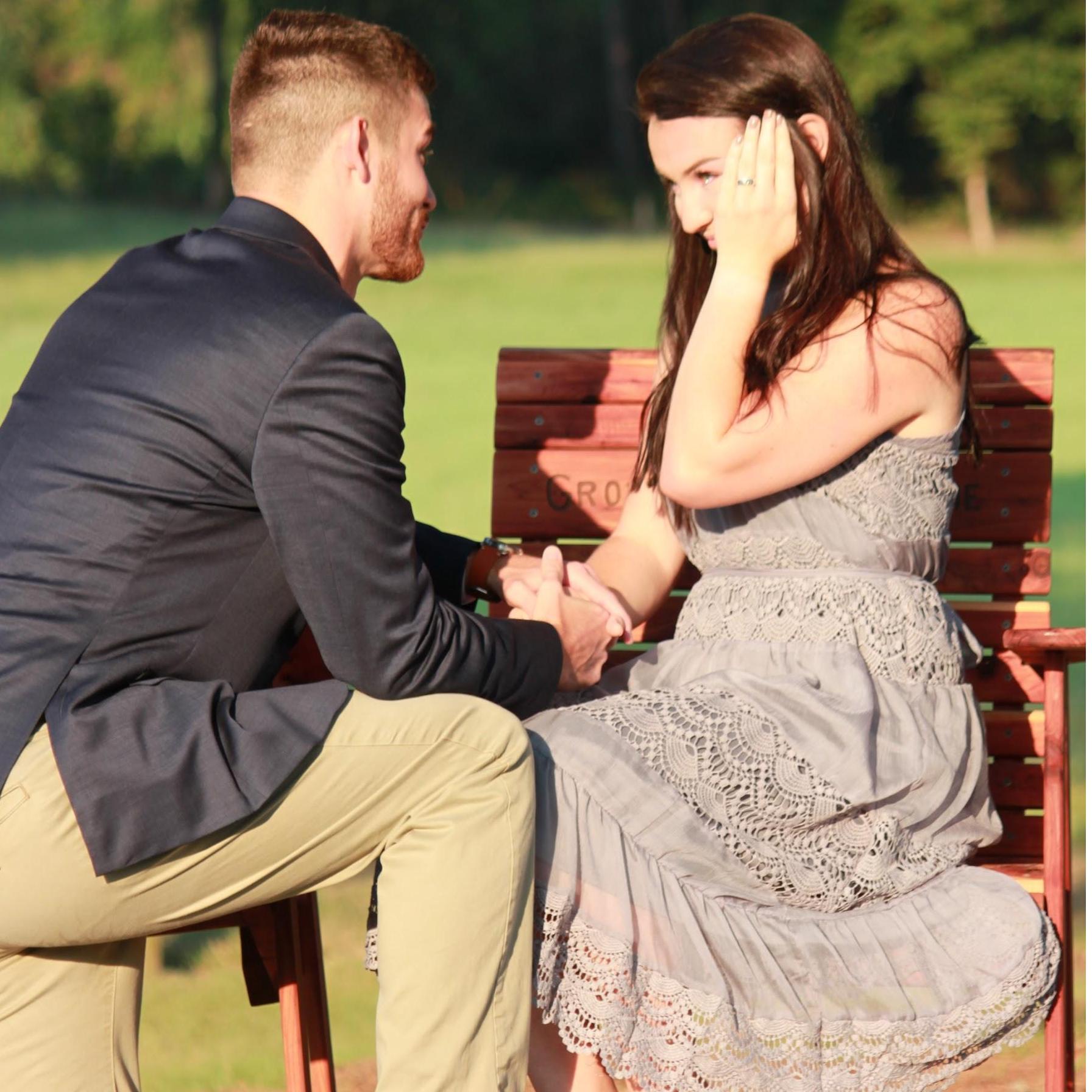 Eventually we walked up to the most beautifully made rocking chairs. Dalton sat me down in mine and proposed in the most amazing way.