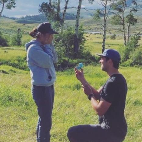 Andrew proposing to Rika at Yellowstone National Park.
