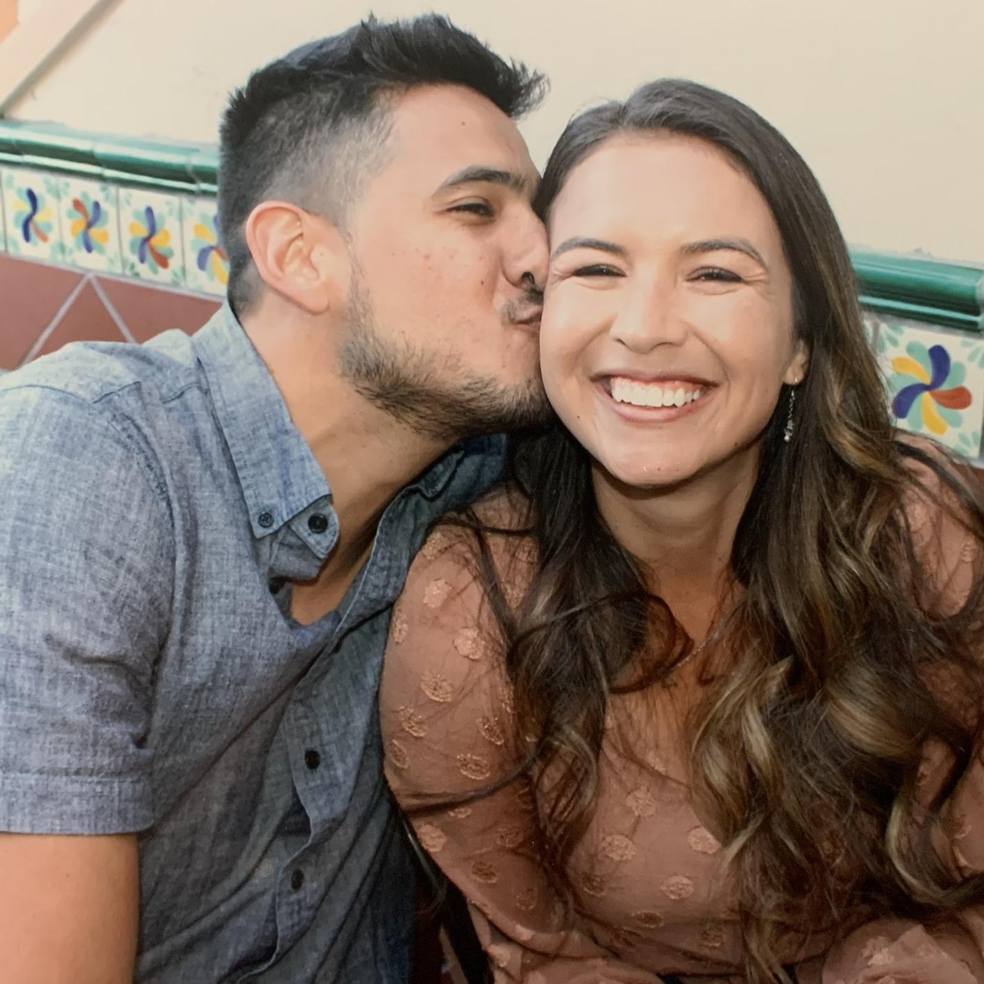 This is from our 2nd date. There was a photographer at the restaurant taking pictures of guests. She said “Give her a kiss!” We laughed nervously because we hadn’t kissed yet.