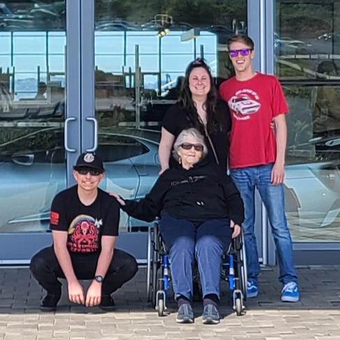 The infamous Grandma Sue and Cameron (brides cousin) taken outside of a car museum near Seattle, Washington.