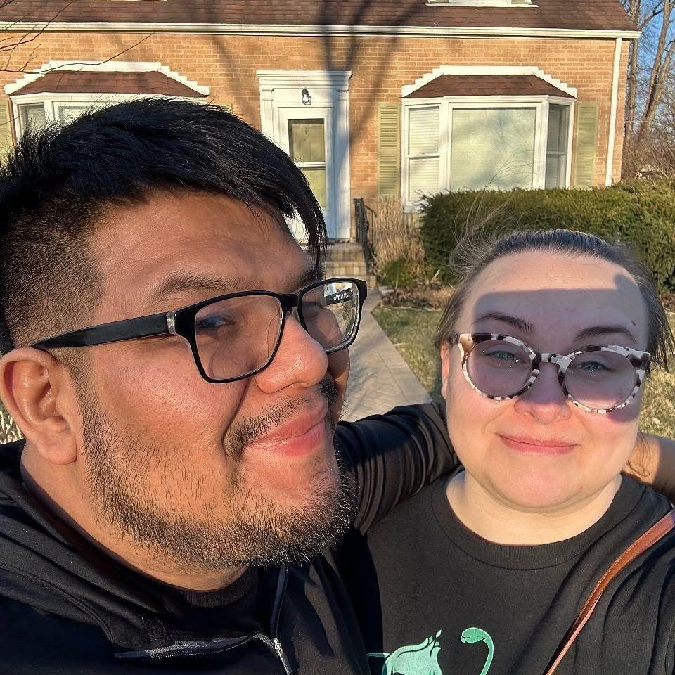 In front of our new home - 2024