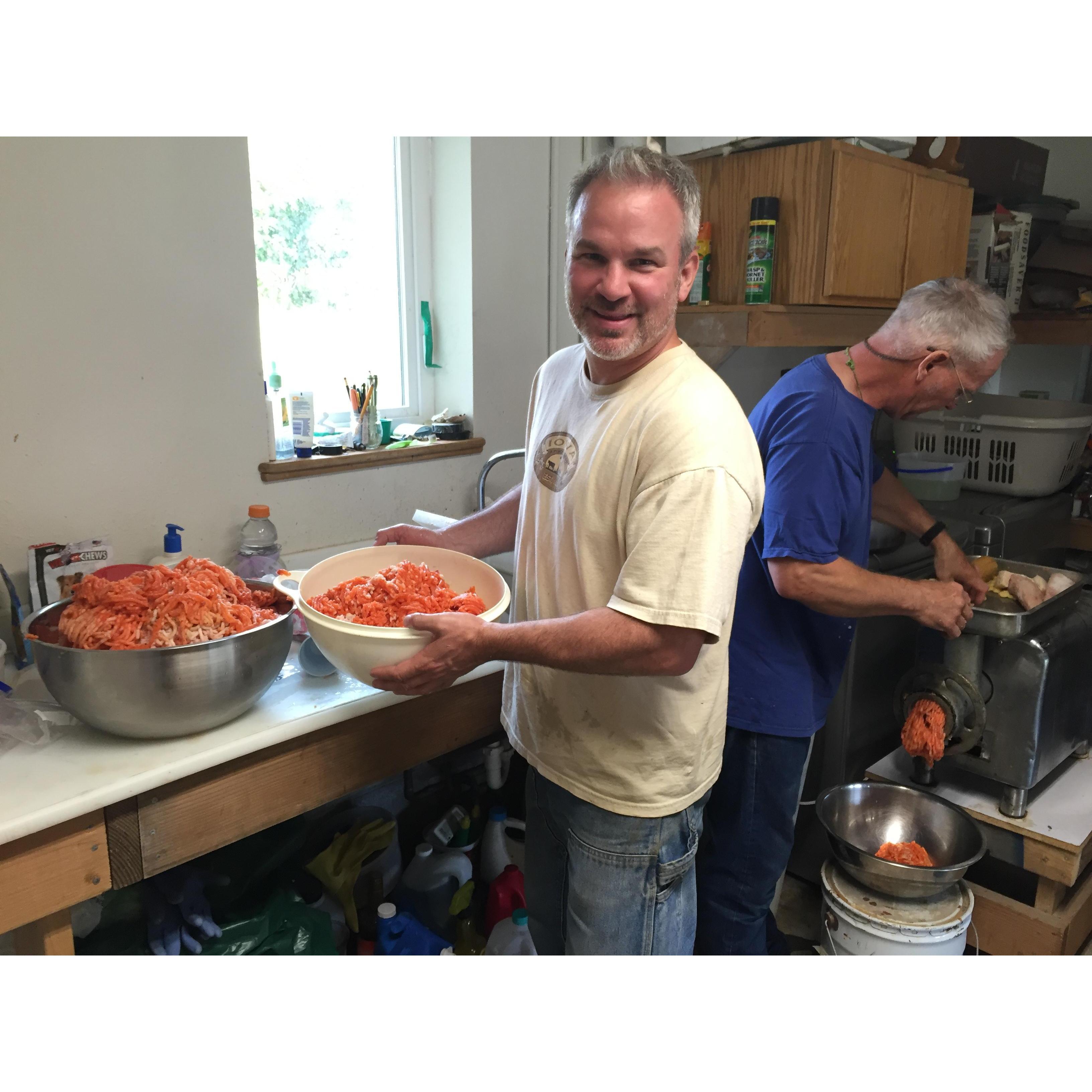 When you have a lot of salmon you start to get creative!  Here's Nate and Rick making some sausage.