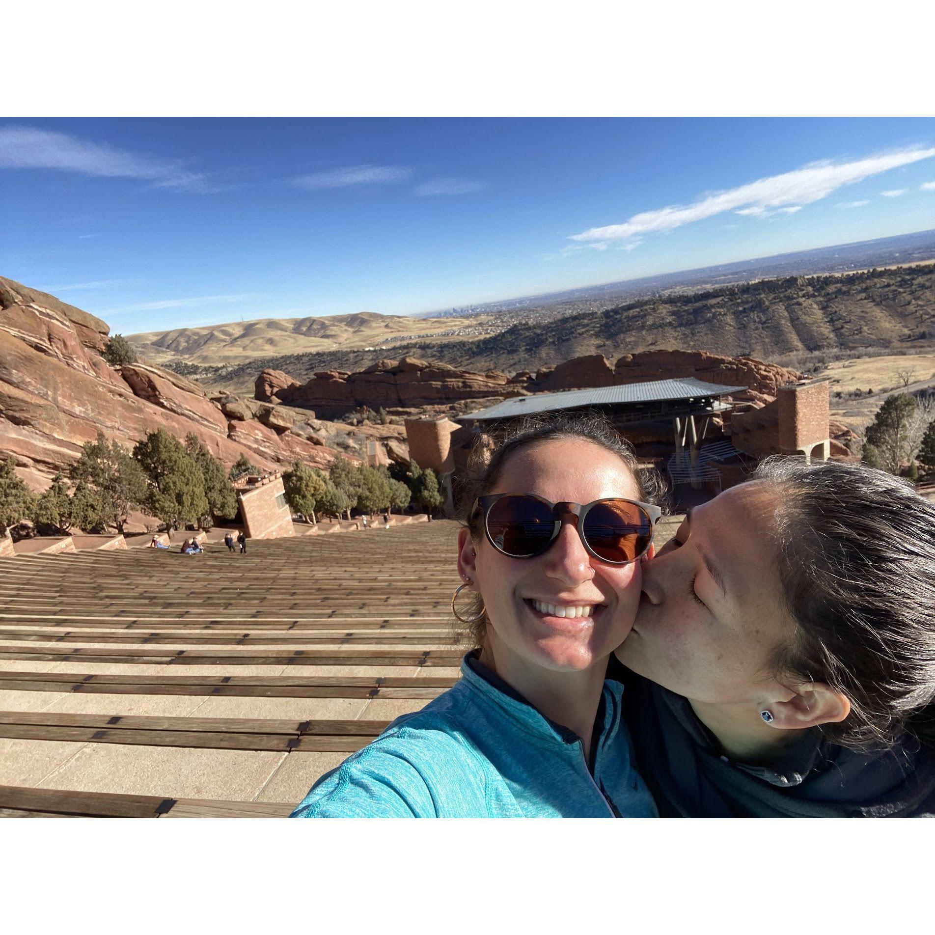 The first time Angier took me to Red Rocks. We raced each other to the top and congratulated each other with a kiss and photo :). Ask the brides who won!