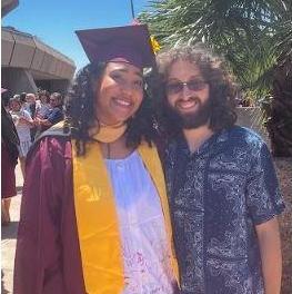 May 2022: Sierra's graduation from graduate school with her biggest support and cheerleader,Isaac.